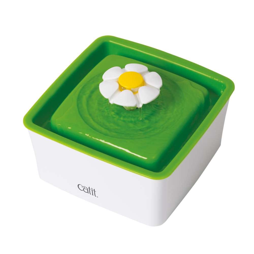 Fontaine à eau mini Catit avec fleur, réservoir 1,5L et eau circulant doucement.